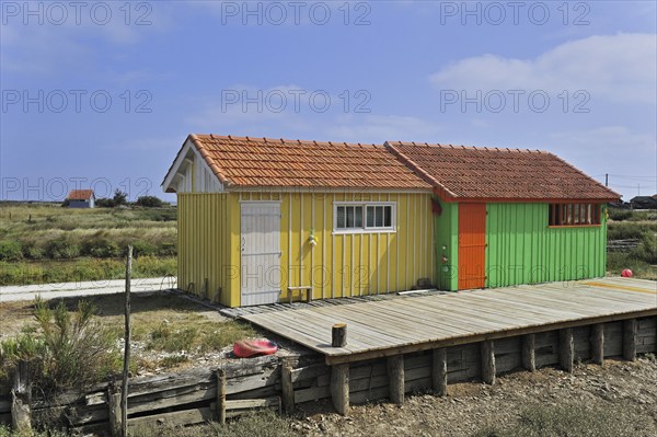 Colourful cabins of oyster farm near Dolus, Saint-Pierre-d'Oléron on the island Ile d'Oléron,