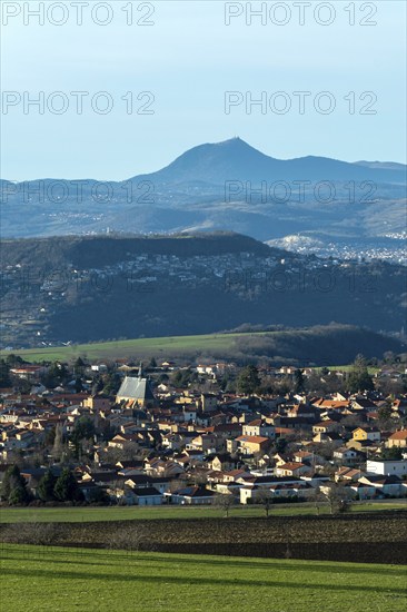 View on Vic le Comte village, Puy de Dome volcano in background, Limagne plain, Puy de Dome