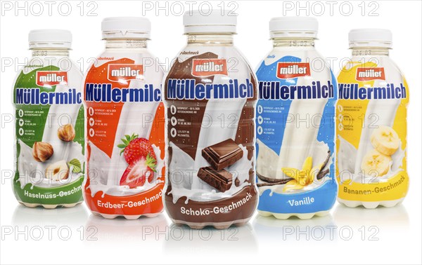 Muller's milk of various flavours in bottles from Theo Müller, cropped against a white background