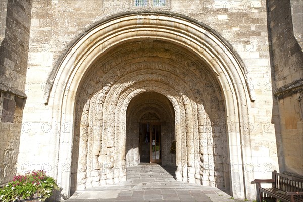 Norman arched door Malmesbury abbey church building, Wiltshire, England, UK
