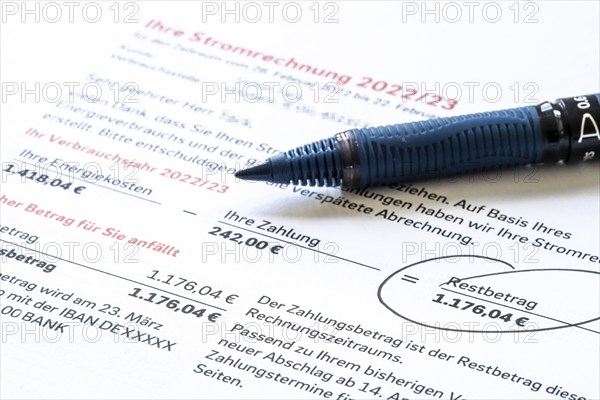 Symbolic image of electricity bill, billing of an electricity provider, additional payment due to