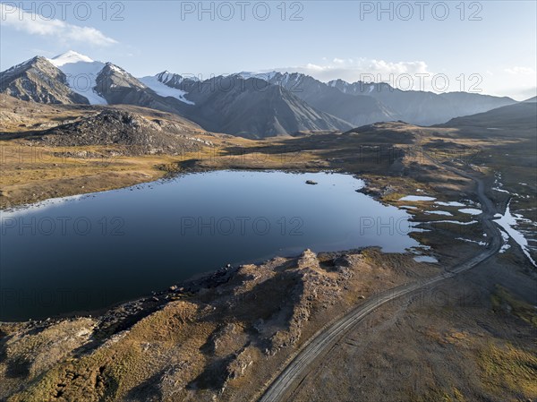 Aerial view, mountain peak and mountain lake, evening mood, Arabel Lake at Arabel Pass, Issyk Kul