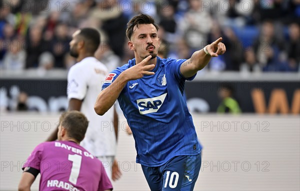 Goal celebration Mergin Berisha TSG 1899 Hoffenheim (10) Disappointment for Jonathan Tah Bayer 04