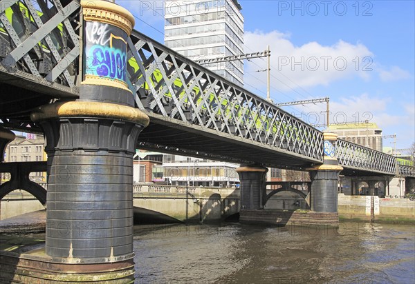 Loopline rail bridge or Liffey viaduct spanning river from Pearse railway station, Dublin, Ireland,