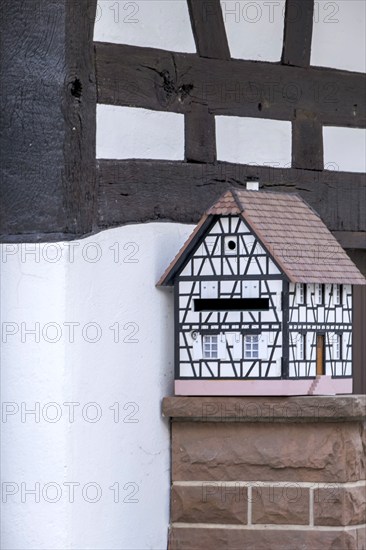 Small half-timbered house as a letterbox, Alsace, France, Europe