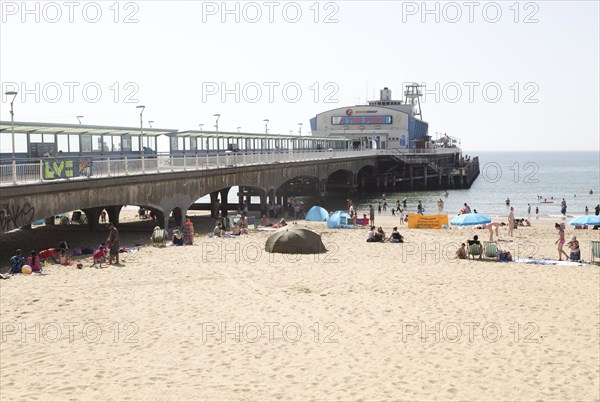 The pier and sandy beach at Bournemouth, Dorset, England, UK