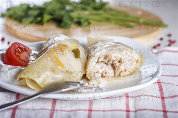 Cabbage rolls with beef, rice and vegetables on a linen tablecloth on a linen tablecloth. close up