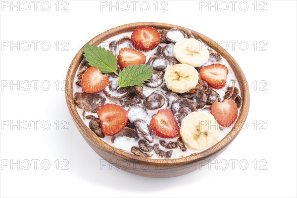 Chocolate cornflakes with milk and strawberry in wooden bowl isolated on white background. Side
