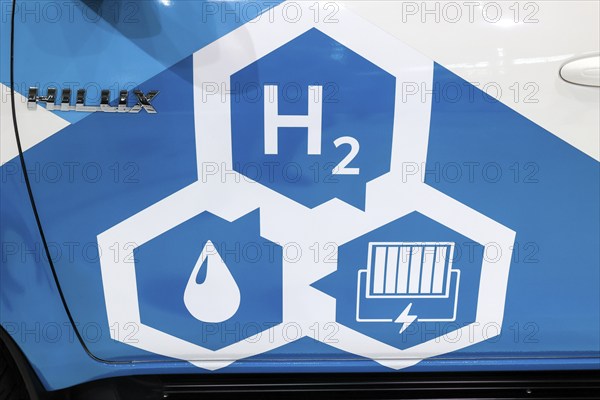 H2 hydrogen fuel cell logo on a Toyoa Hilux Fuel Cell Electric Vehicle at the IAA Transportation
