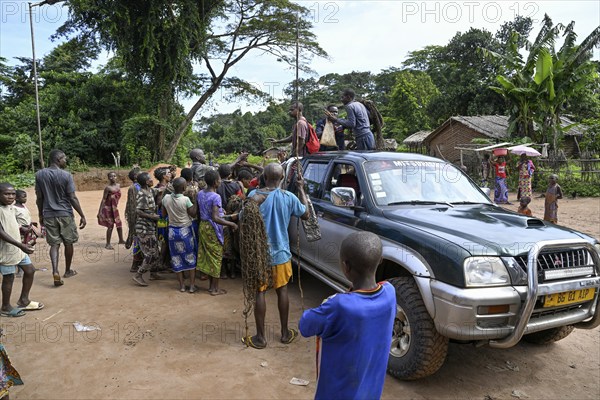 Pygmies of the Baka or BaAka people on a pickup truck, Bayanga, Sangha-Mbaéré Prefecture, Central