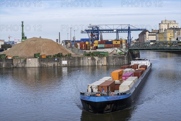 Container freighter Aarburg, leaving the container terminal in Frankfurt Osthafen, belonging to