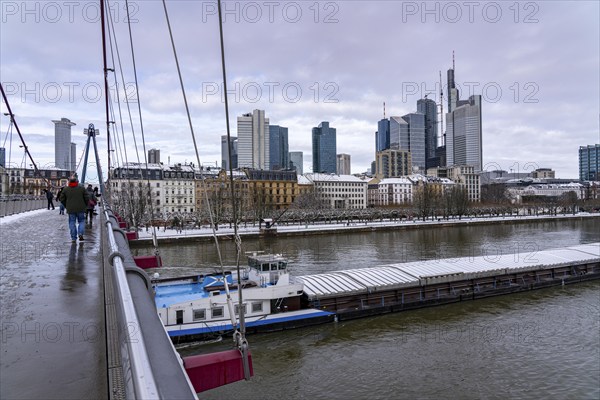 Winter in Frankfurt, view of the skyline of the city centre, from the Holbeinsteg foot and cycle