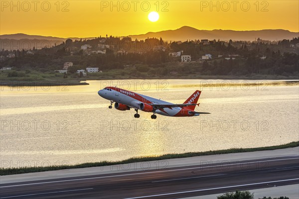 An EasyJet Airbus A320 aircraft with the registration G-EZUC at Corfu Airport, Greece, Europe