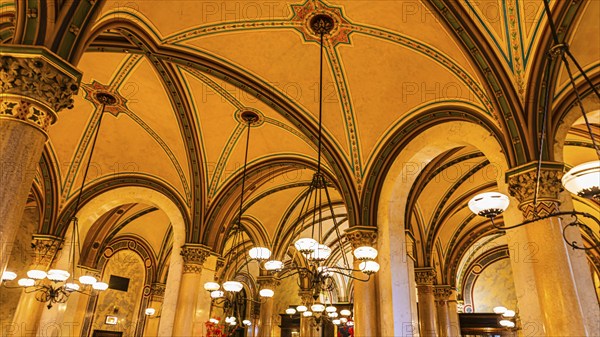 Chandeliers, columns and vaulted ceilings in Cafe Central, Herrengasse, Vienna, Austria, Europe