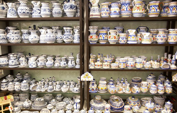 Display of pottery inside Santa Ana ceramic tile shop in Triana, Seville, Spain, Europe