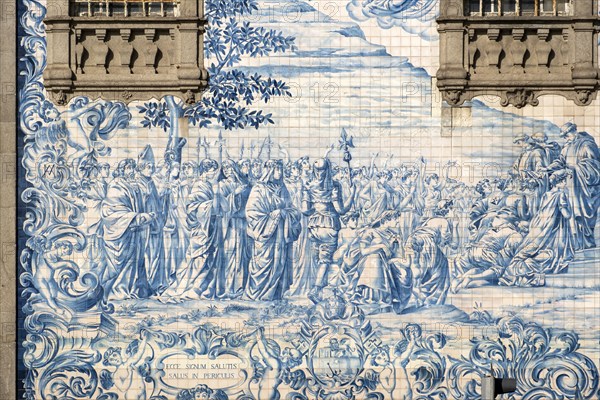 A detailed view of the exquisite blue and white azulejos tiles adorning the walls of Igreja do