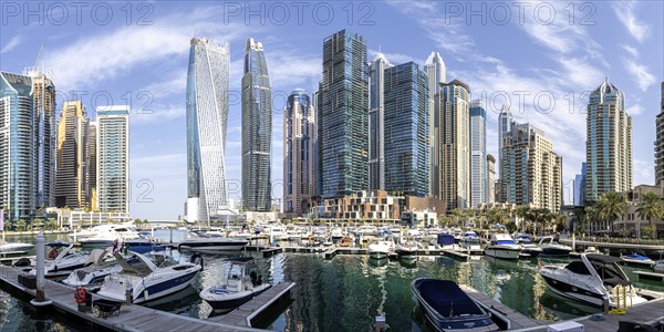 Dubai Marina skyline skyscrapers with yachts property skyscrapers living on the water panorama in