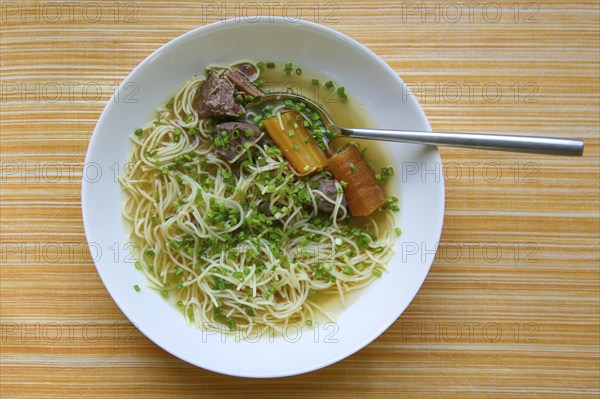 Swabian cuisine, Swabian noodle soup, soup, meat broth with noodles, chives, carrots, carrots,