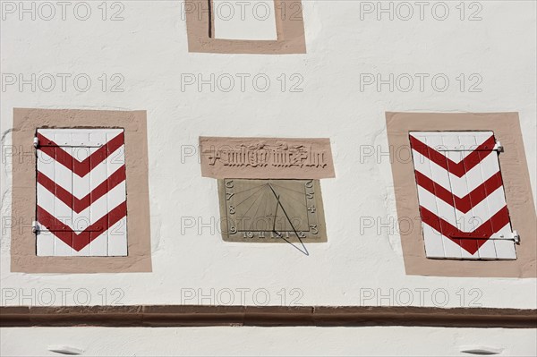 Sundial on a house facade, Lemgo, North Rhine-Westphalia, Germany, Europe