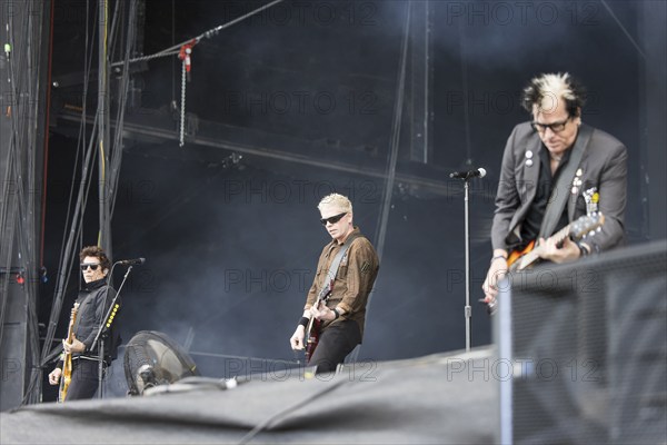 Todd Morse (bassist), Bryan Dexter Holland (singer and guitarist) and Kevin Noodles Wasserman