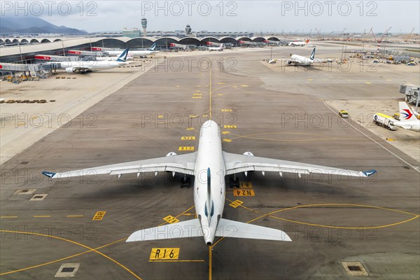 A Cathay Pacific Airbus A330-300 aircraft with registration B-HLP at Chek Lap Kok Airport (HKG) in