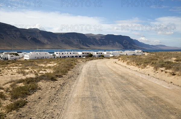 Dirt track leading to Caleta de Sebo village on Graciosa island, Lanzarote, Canary Islands, Spain,