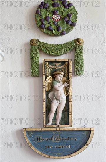 Painted plaster angels in village parish church of Saint Michael, Wilsford cum Lake, Wiltshire,