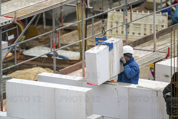 Construction site, new construction of apartment blocks, shell construction, North