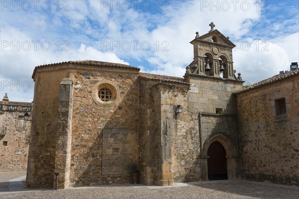 Historic church with stone walls under a blue sky, Convento de San Pablo, nunnery, old town,