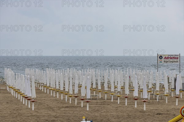 Bagni Lungomare, Chioggia. Bathing beach on the Adriatic in bad weather. All deckchairs are free.
