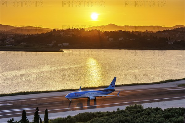A TUI Boeing 737-800 aircraft with the registration G-FDZR at Corfu Airport, Greece, Europe