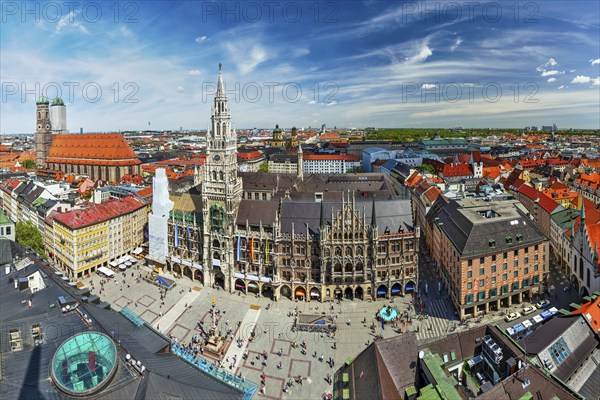 Aerial fish eye view of Munich, Marienplatz, Neues Rathaus and Frauenkirche from St. Peter's church