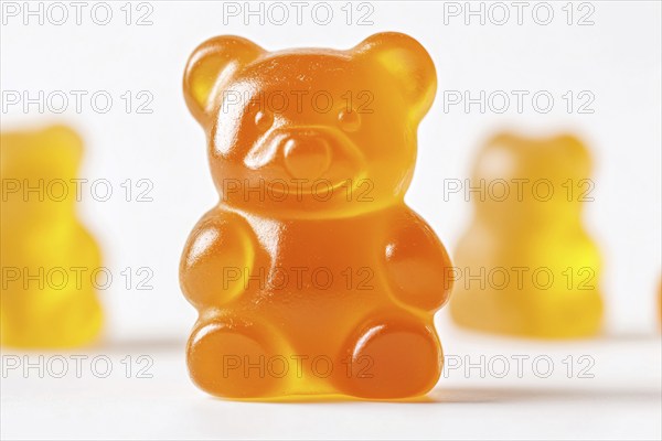 Cute orange jelly bear fruit gum candy on white background. Generative Ai, AI generated