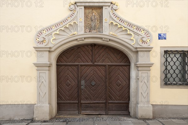 Entrance portal of the Old Dechantei of the Old Chapel with relief of the Virgin and Child, late