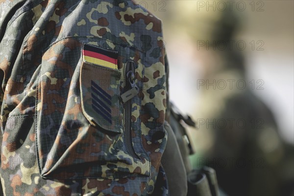 Insignia and rank on the uniform of a Bundeswehr soldier, taken during the military exercise