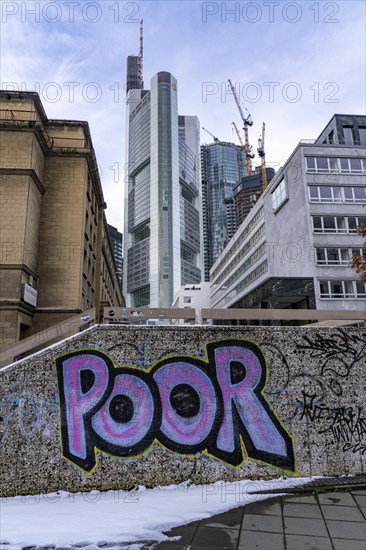 Winter in Frankfurt, view of the city skyline, graffiti on a wall at the theatre tunnel, Poor,