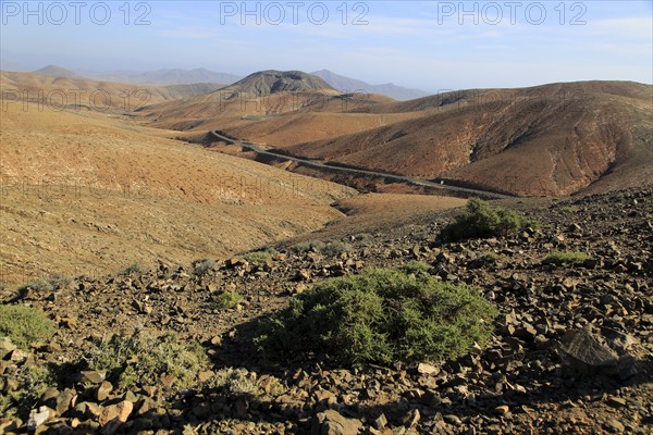 Bare moon-like arid landscape in mountains between Pajara and La Pared, Fuerteventura, Canary
