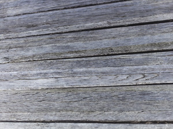 Old dirty wooden gray-brown texture in the park
