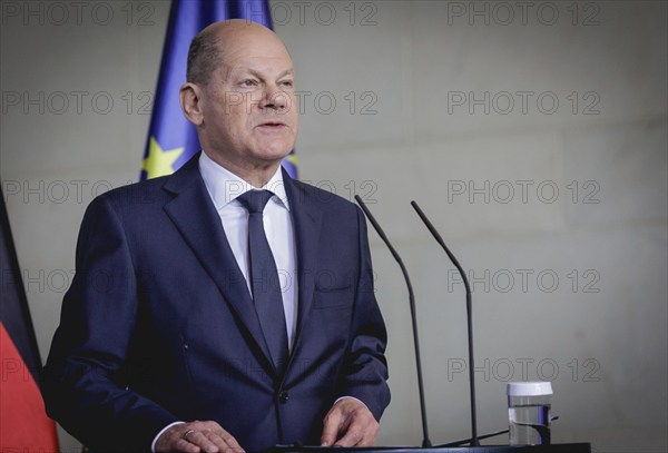 Olaf Scholz, Federal Chancellor, speaks at a press conference during the visit of Denis Becirovic,