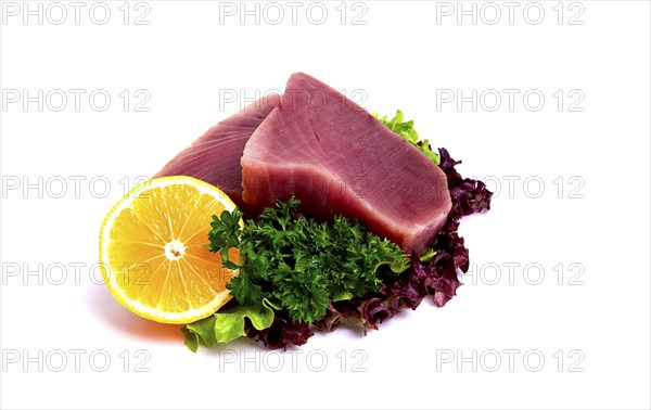 Raw steak, tuna fish, on a white background, close-up