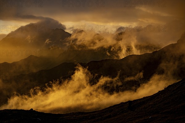 Montafon mountains with dramatic cloudy sky at sunset, Tschagguns, Rätikon, Montafon, Vorarlberg,