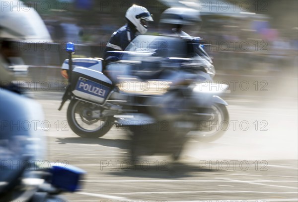 Berlin police officers from the motorbike squadron during a column ride at the Berlin police open
