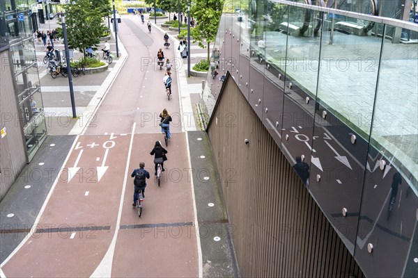 Entrance and exit of the bicycle car park at Utrecht Centraal station, Stationsplein, over 13, 000