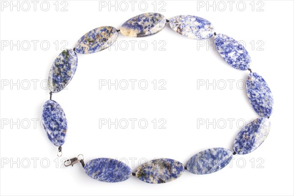 Colored onyx beads isolated on white background. top view, close up