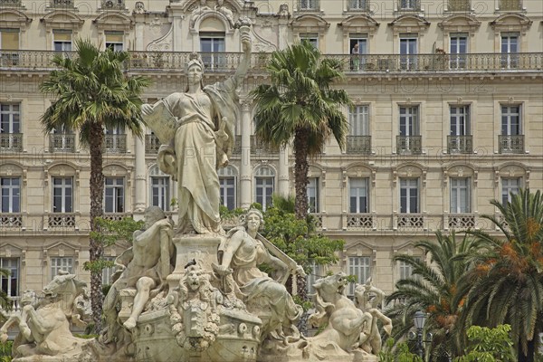 Fontaine de la Fédération built in 1890 with sculptures and decorations and palm trees, Grand