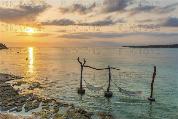 Hammock in the sea water in front of the holiday island Nusa Lembongan, beach, beach holiday, beach