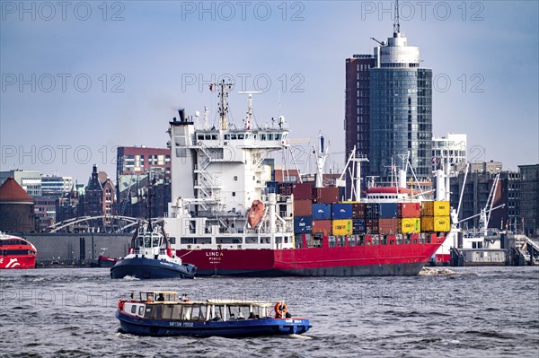 Container freighter, feeder ship on the Elbe, Elbe Philharmonic Hall, Hamburg, Germany, Europe