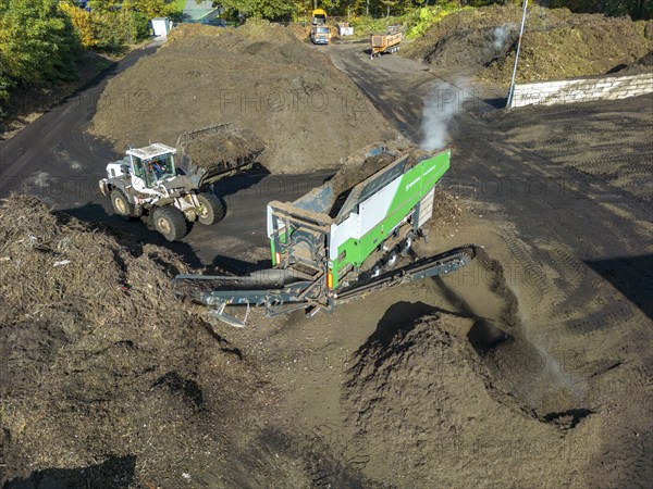Composting plant, organic waste is composted, sorted by size, smaller parts are reused as compost,