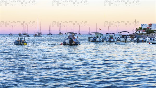 Sailing yachts at the blue hour in the bay of Talamanca, Eivissa, Ibiza Town, Ibiza, Balearic