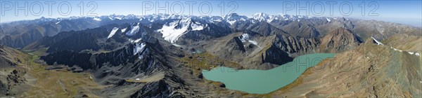Mountain panorama, aerial view, 4000 metre peak with glacier, mountain pass and mountain lake